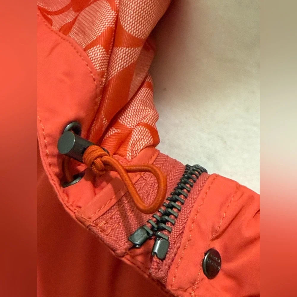 Coach. Utility Rain Jacket. Coral. Size XS.